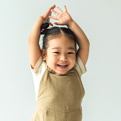 girl standing and smiling